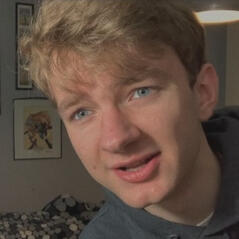 Image of TommyInnit, taken from Dream merch video.